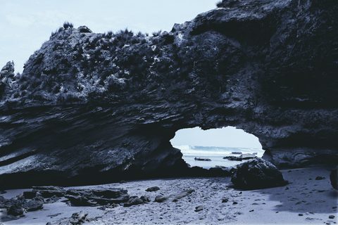 a_rock_formation_with_a_hole_in_the_middle-nature.jpg